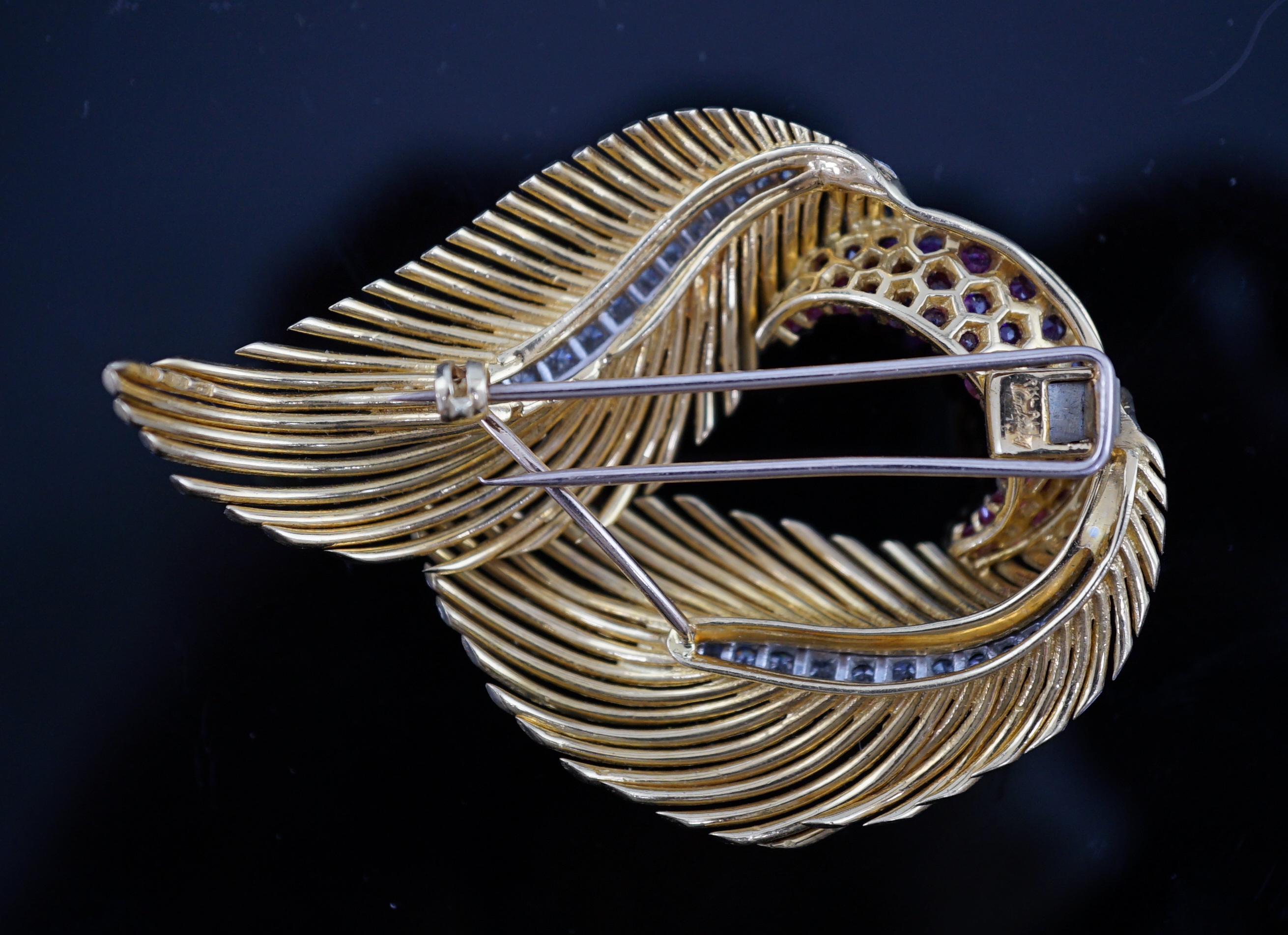 A 1960's Kutchinsky 18ct gold, ruby and diamond cluster set double fern clip brooch